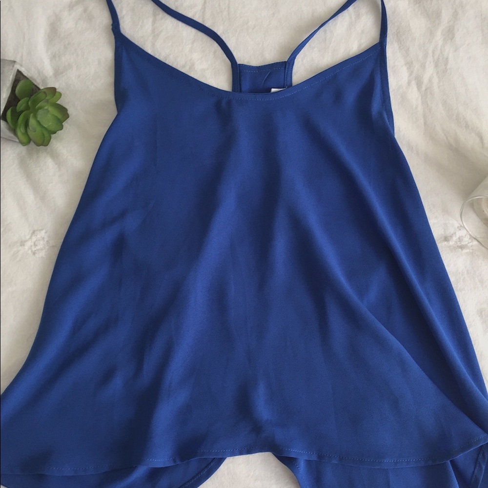 Blue loose blouse by Lush.